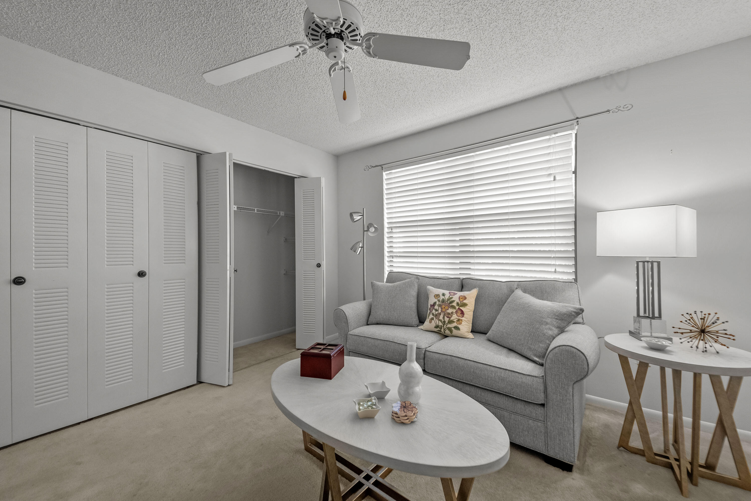 5080 Nesting Way, Unit A Delray Beach, FL 33484 - Photo 15 of 37 a living room with furniture and a table