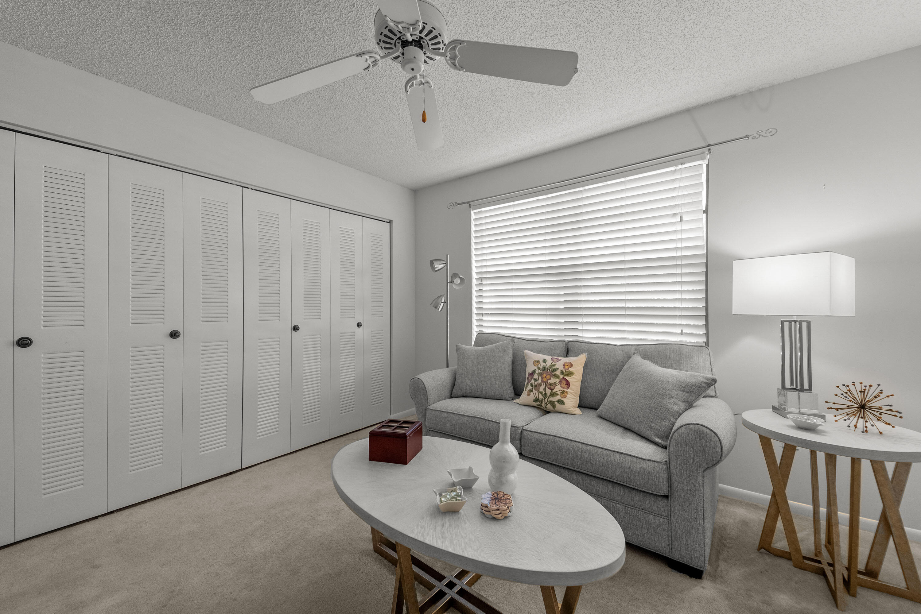 5080 Nesting Way, Unit A Delray Beach, FL 33484 - Photo 16 of 37 a living room with furniture and a window
