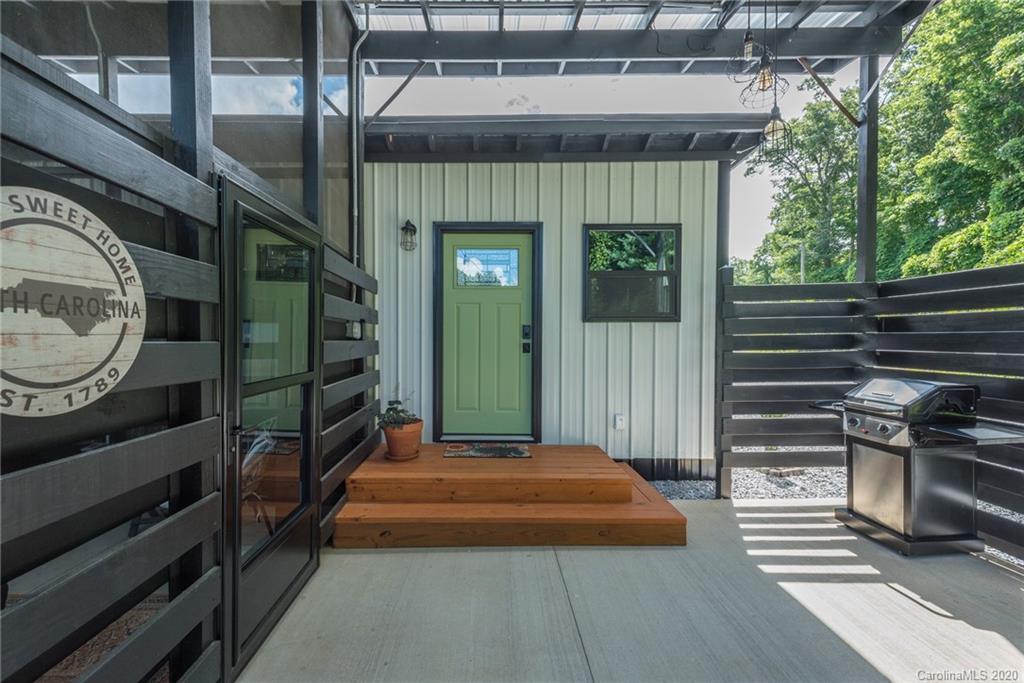 a view of a porch with furniture