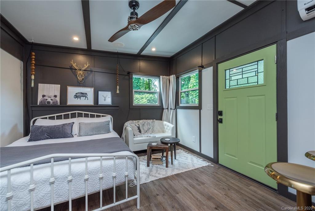 787 Ridge Road Marion, NC 28752 - Photo 16 of 47 a living room with furniture and a wooden floor