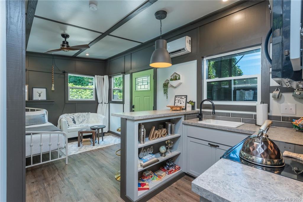 787 Ridge Road Marion, NC 28752 - Photo 23 of 47 a room with furniture and a large window