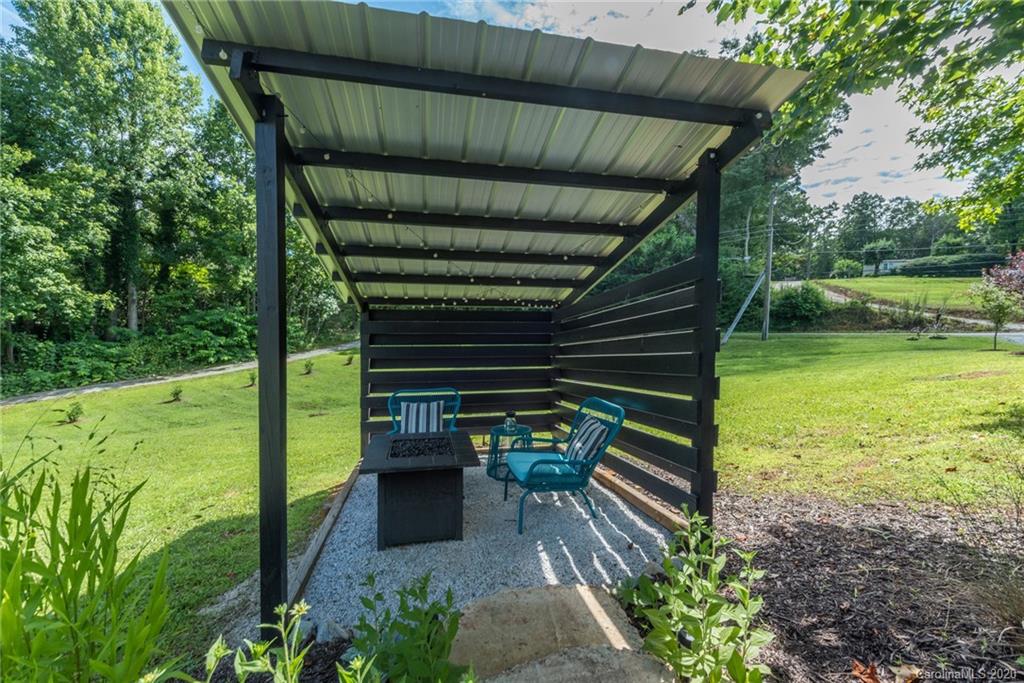 787 Ridge Road Marion, NC 28752 - Photo 30 of 47 a view of a backyard with a garden