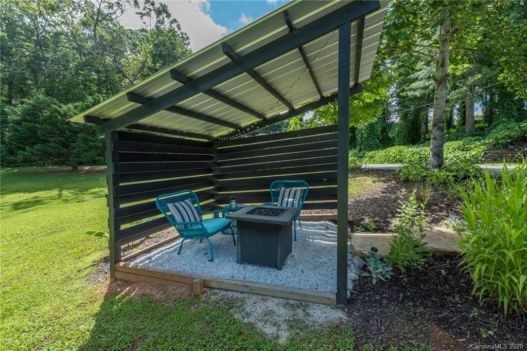 787 Ridge Road Marion, NC 28752 - Photo 31 of 47 a view of backyard with seating and green space