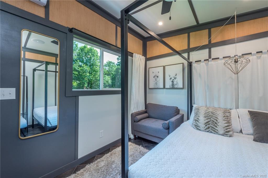 787 Ridge Road Marion, NC 28752 - Photo 41 of 47 a bedroom with furniture and a window