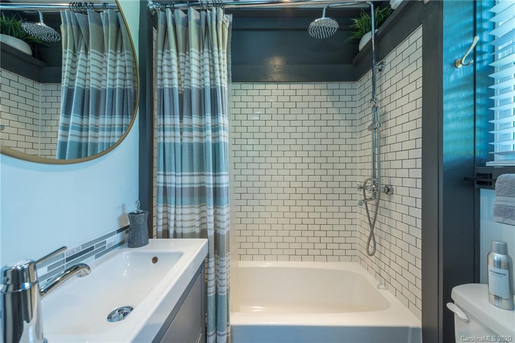 787 Ridge Road Marion, NC 28752 - Photo 43 of 47 a bathroom with a bathtub and shower