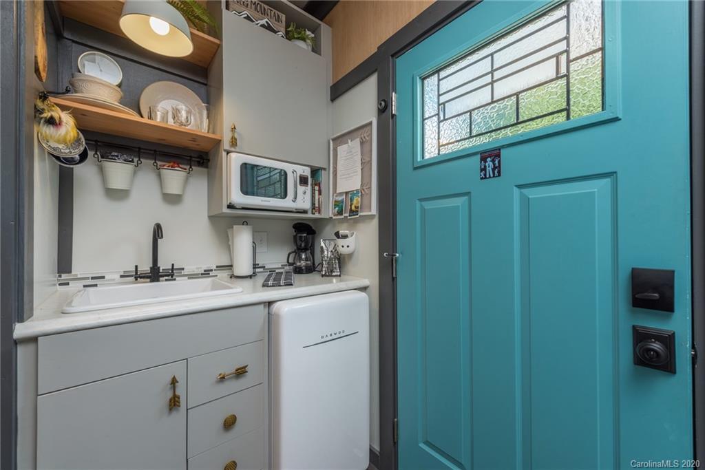 787 Ridge Road Marion, NC 28752 - Photo 45 of 47 a view of a kitchen cabinets a sink and dishwasher