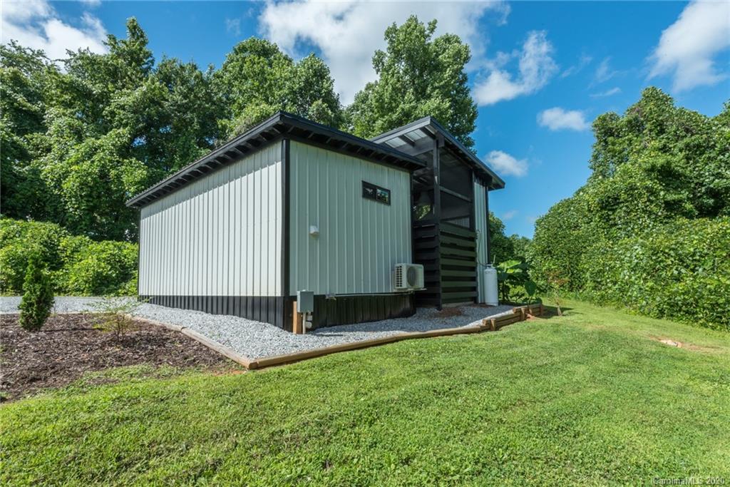 787 Ridge Road Marion, NC 28752 - Photo 47 of 47 a view of backyard with a garden and plants