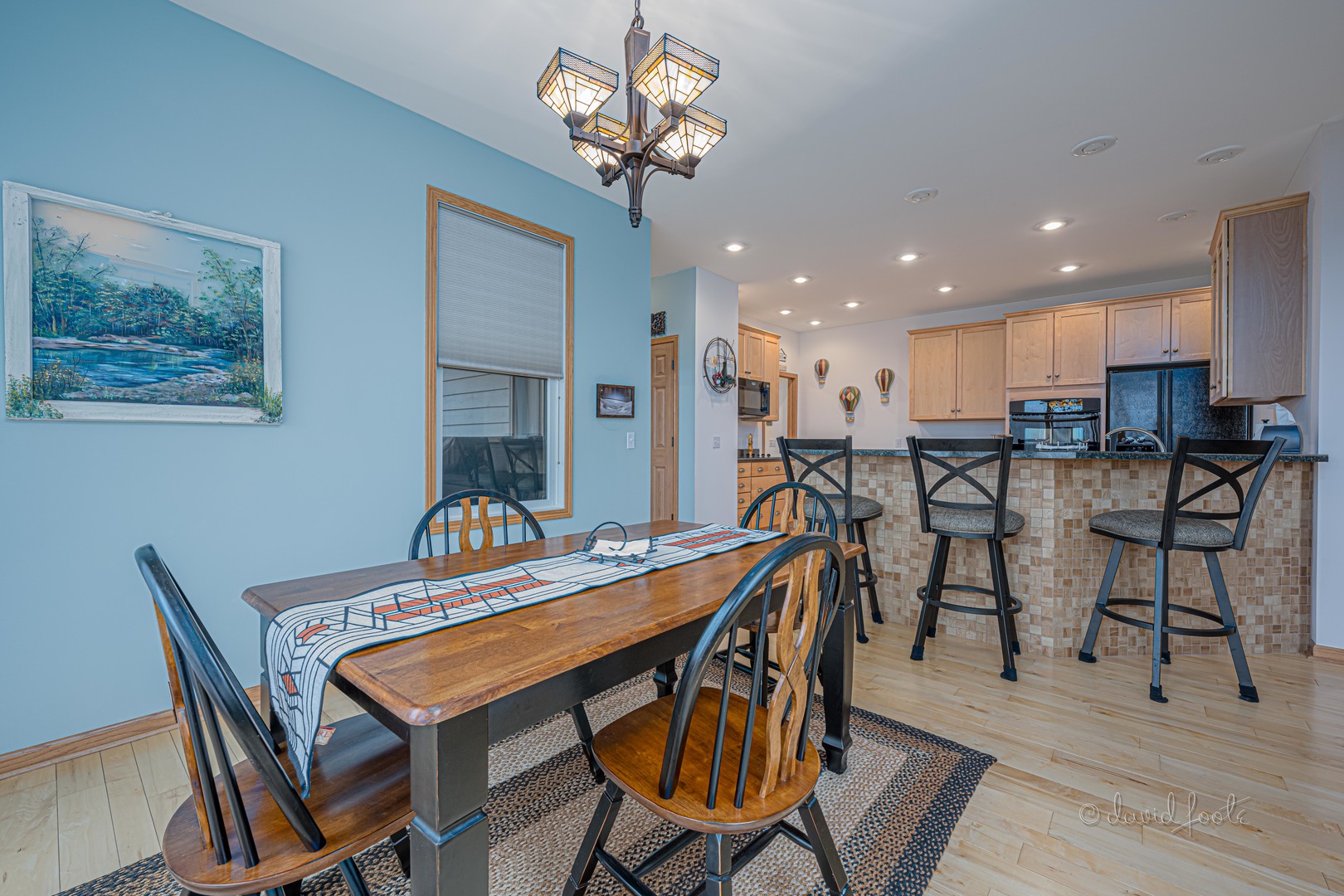 4 Saddleback Road Galena, IL 61036 - Photo 12 of 30 a view of a dining room with furniture and wooden floor