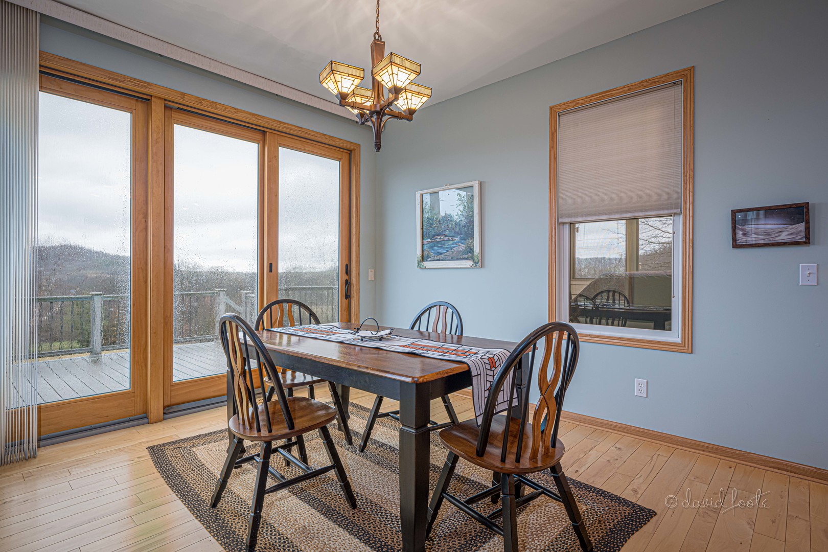 4 Saddleback Road Galena, IL 61036 - Photo 13 of 30 a view of a dining room with furniture large window and wooden floor