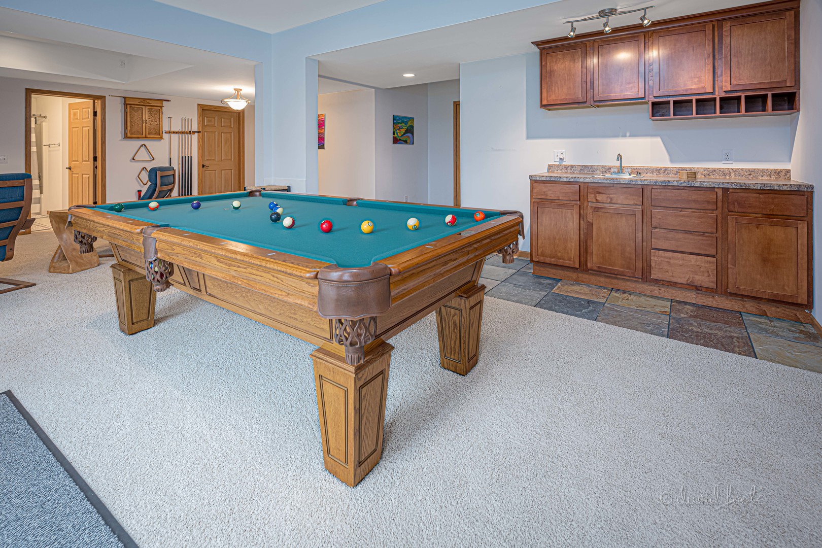 4 Saddleback Road Galena, IL 61036 - Photo 20 of 30 a room with pool table chair and flat screen tv