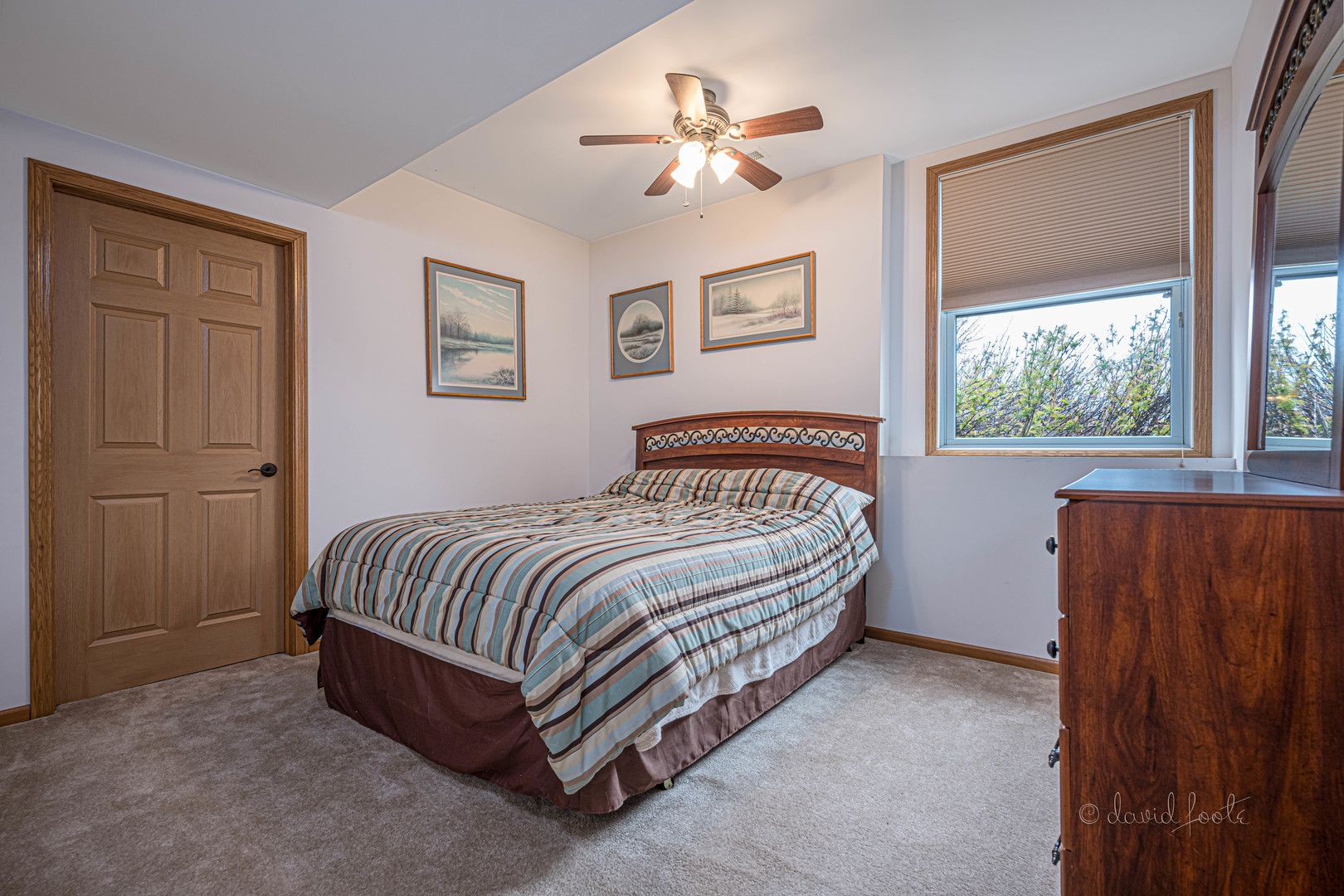 4 Saddleback Road Galena, IL 61036 - Photo 24 of 30 a spacious bedroom with a bed and a window