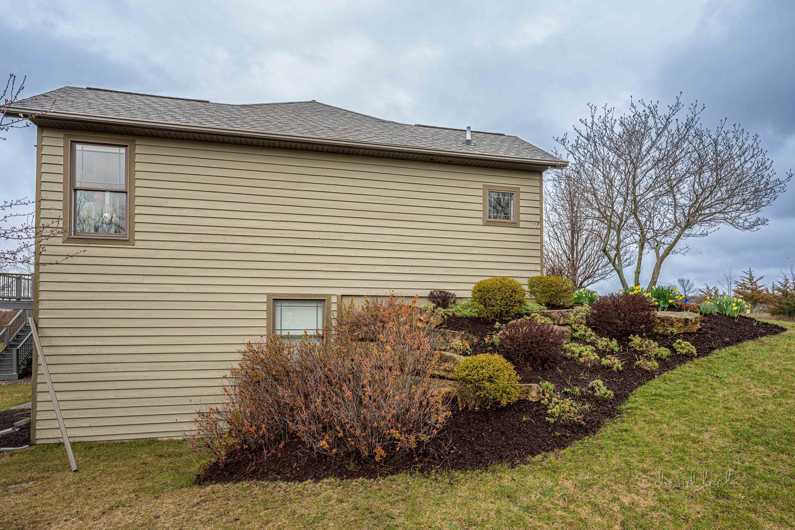4 Saddleback Road Galena, IL 61036 - Photo 29 of 30 a view of a house with a yard and a garage