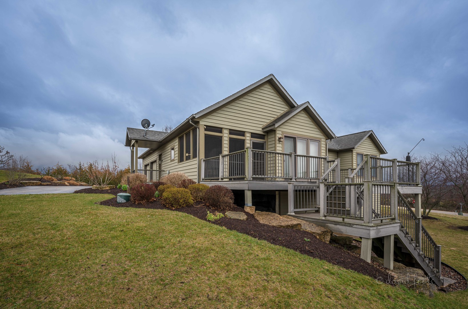 4 Saddleback Road Galena, IL 61036 - Photo 30 of 30 a view of a house with a yard and sitting area
