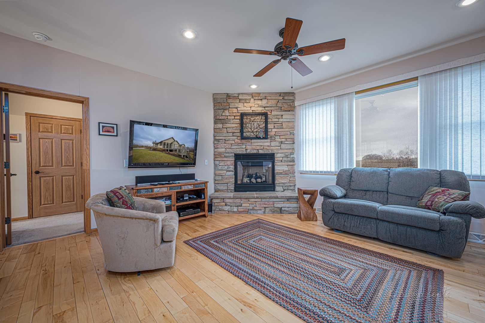 4 Saddleback Road Galena, IL 61036 - Photo 5 of 30 a living room with furniture and a flat screen tv