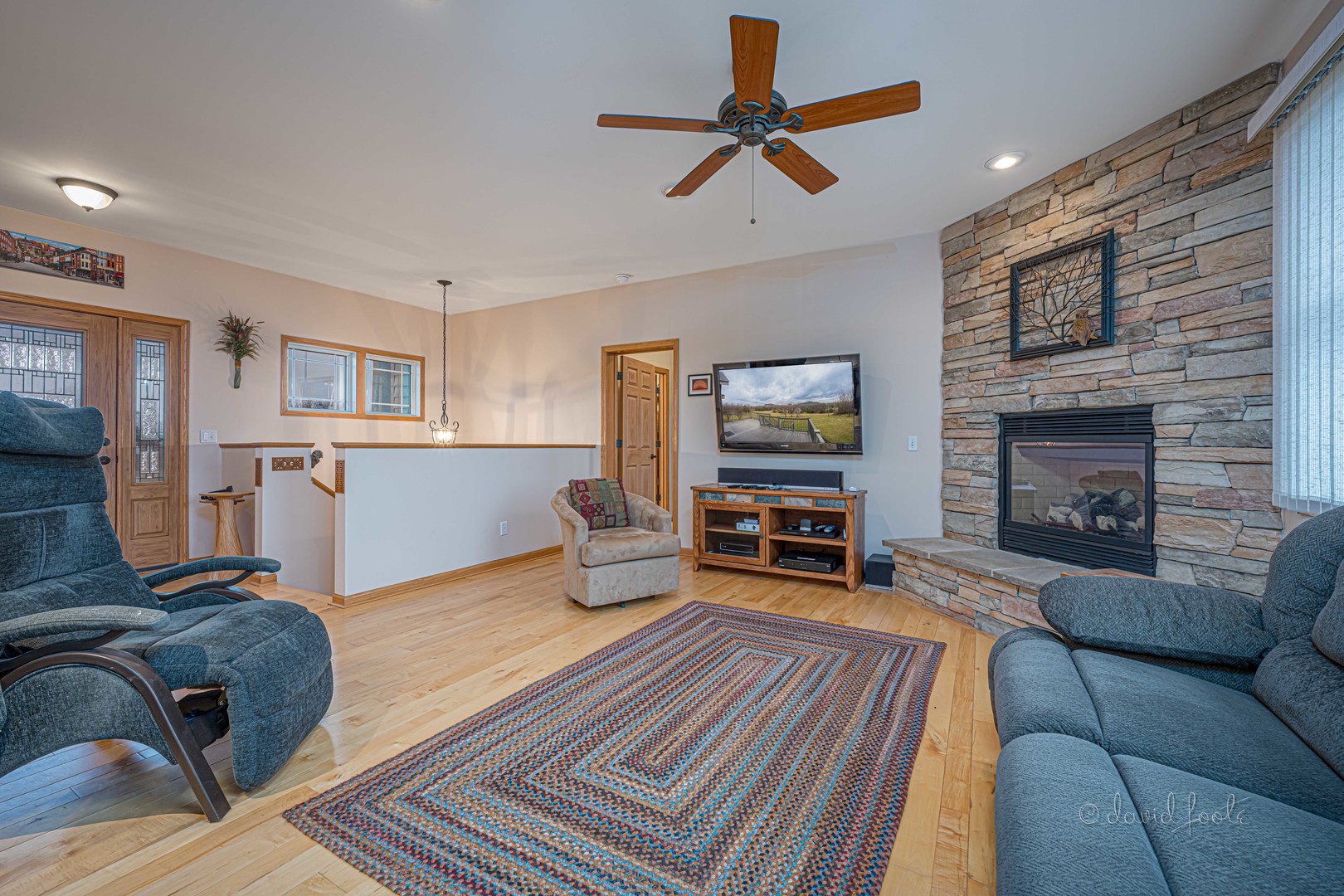 4 Saddleback Road Galena, IL 61036 - Photo 6 of 30 a living room with furniture and a fireplace