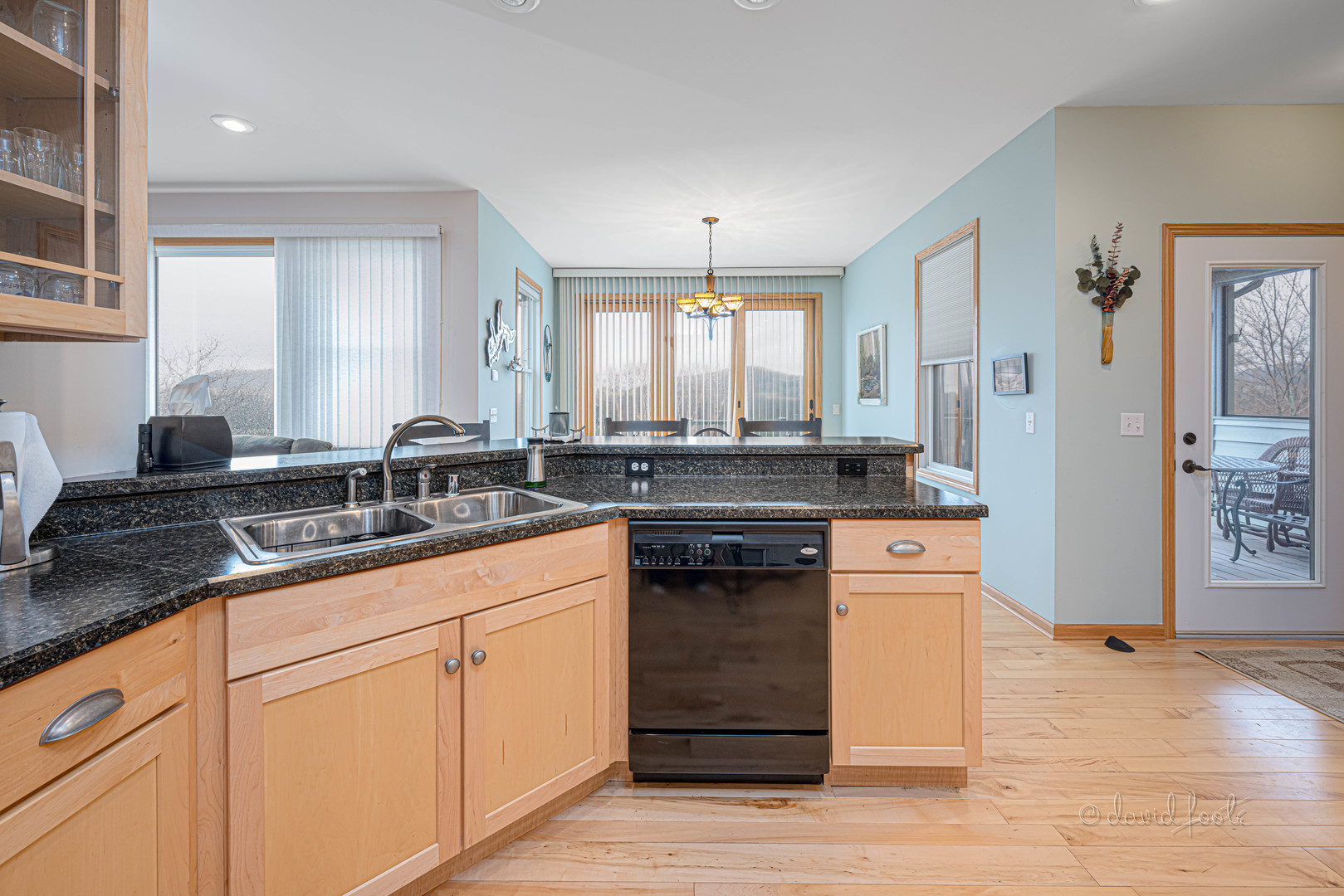 4 Saddleback Road Galena, IL 61036 - Photo 9 of 30 a kitchen with granite countertop a sink stainless steel appliances and cabinets