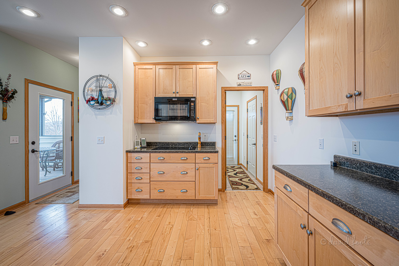 4 Saddleback Road Galena, IL 61036 - Photo 10 of 30 a kitchen with stainless steel appliances granite countertop a refrigerator and a stove top oven