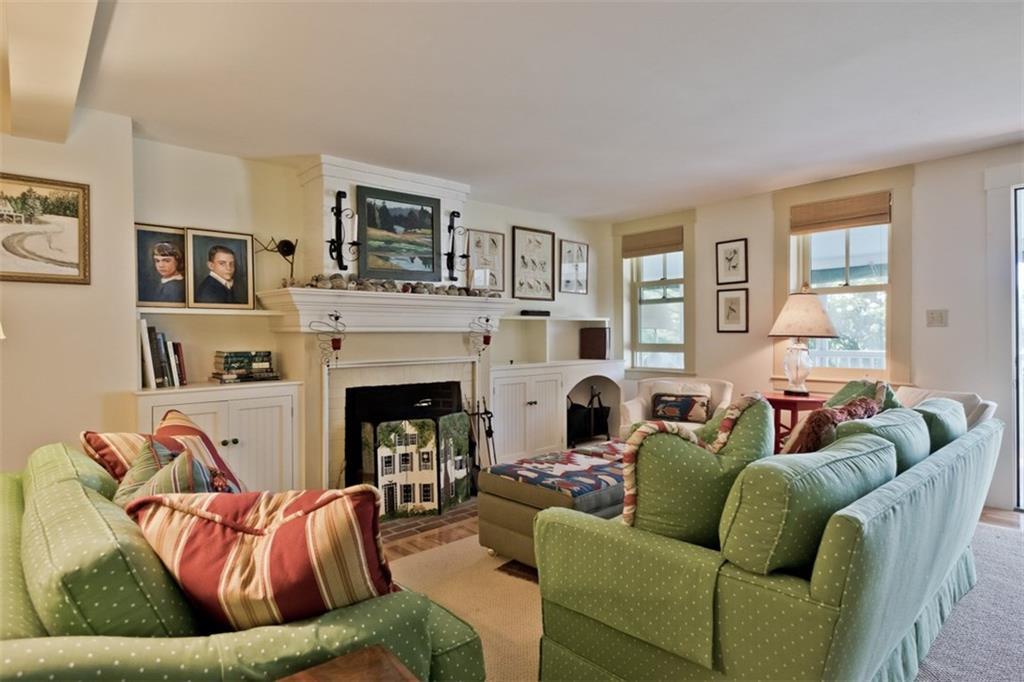 1097 Main Street Lovell, ME 04051 - Photo 14 of 34 The living room has a fireplace and...
