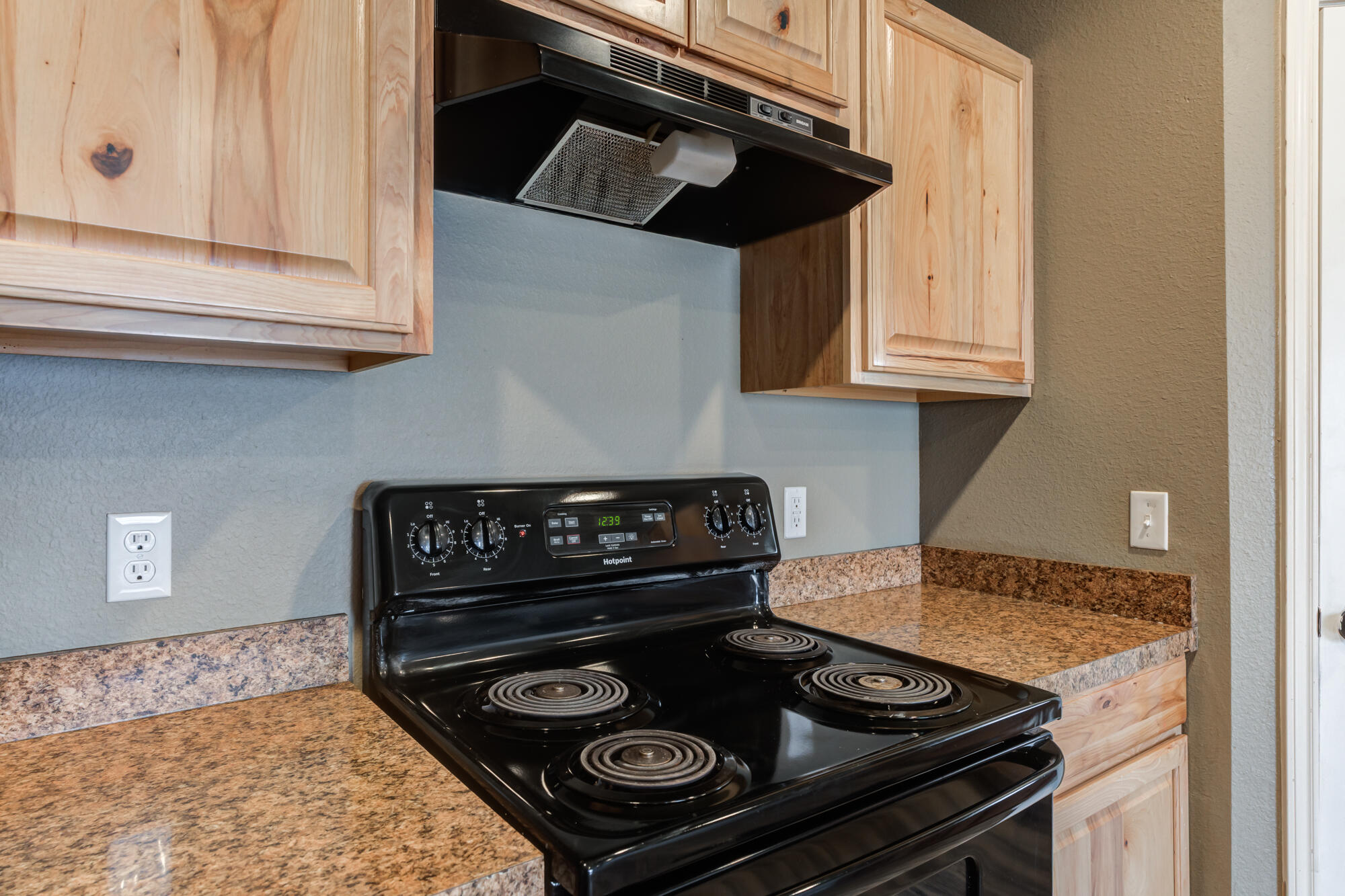 2832 East 7th Street Lubbock, TX 79403 - Photo 12 of 25 a stove top oven sitting inside of a kitchen