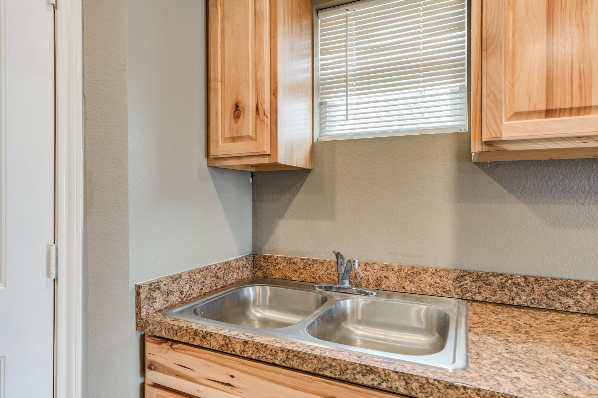 2832 East 7th Street Lubbock, TX 79403 - Photo 13 of 25 a close view of sink and tap