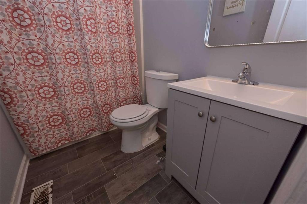 113 Millwheel Drive Villa Rica, GA 30180 - Photo 23 of 34 a bathroom with a sink and a toilet