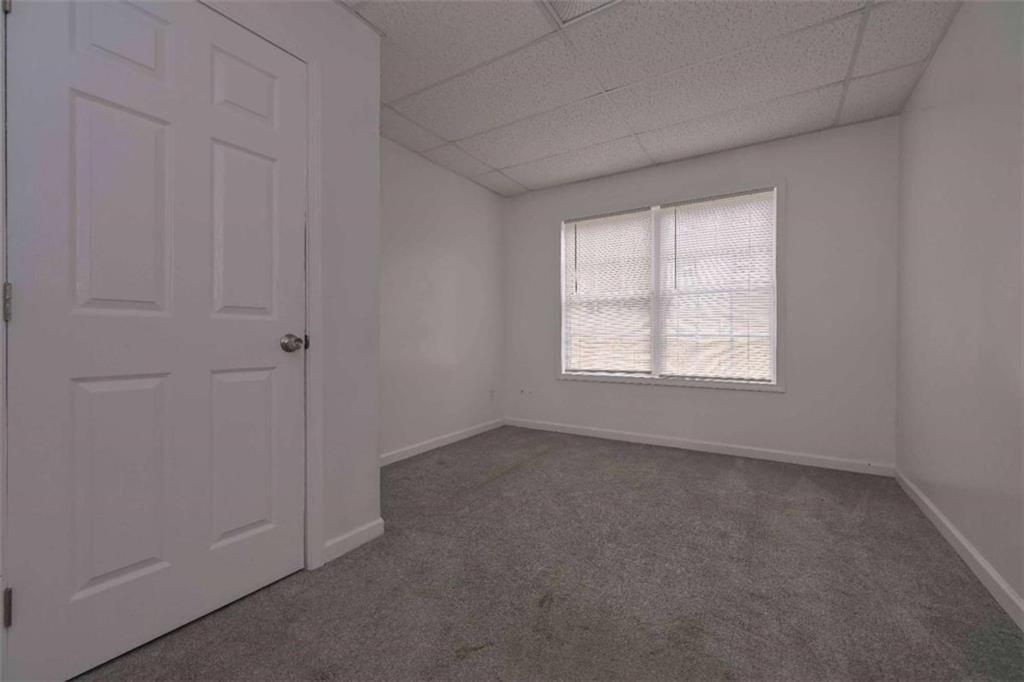 113 Millwheel Drive Villa Rica, GA 30180 - Photo 24 of 34 an empty room with windows