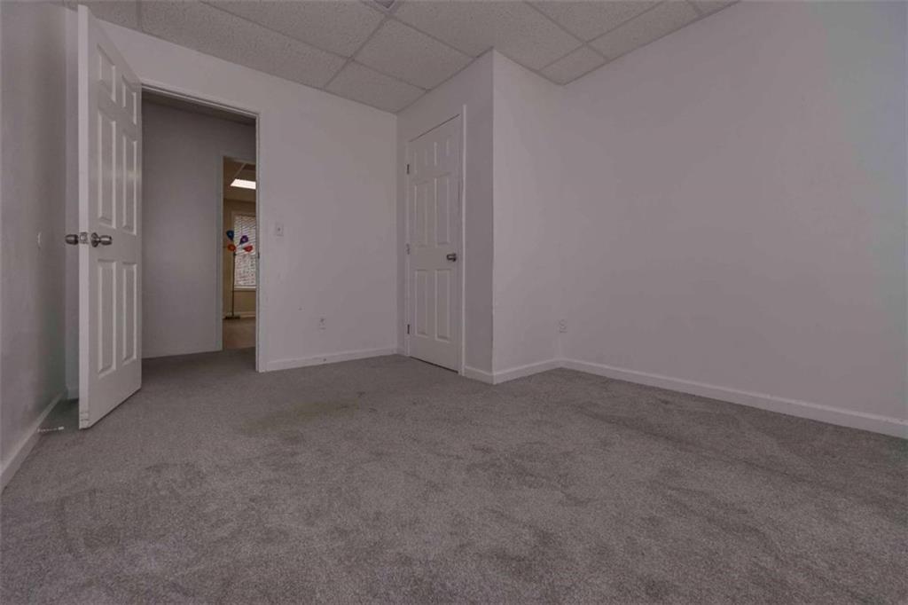 113 Millwheel Drive Villa Rica, GA 30180 - Photo 25 of 34 an empty room that has a grey walls