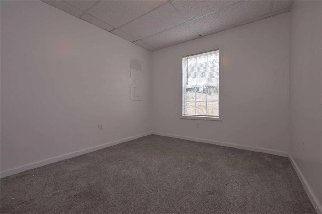 113 Millwheel Drive Villa Rica, GA 30180 - Photo 26 of 34 an empty room with a window