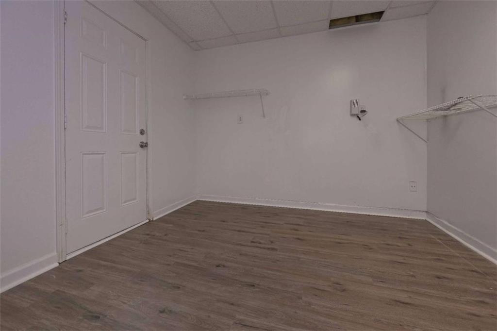 113 Millwheel Drive Villa Rica, GA 30180 - Photo 28 of 34 a view of an empty room with wooden floor