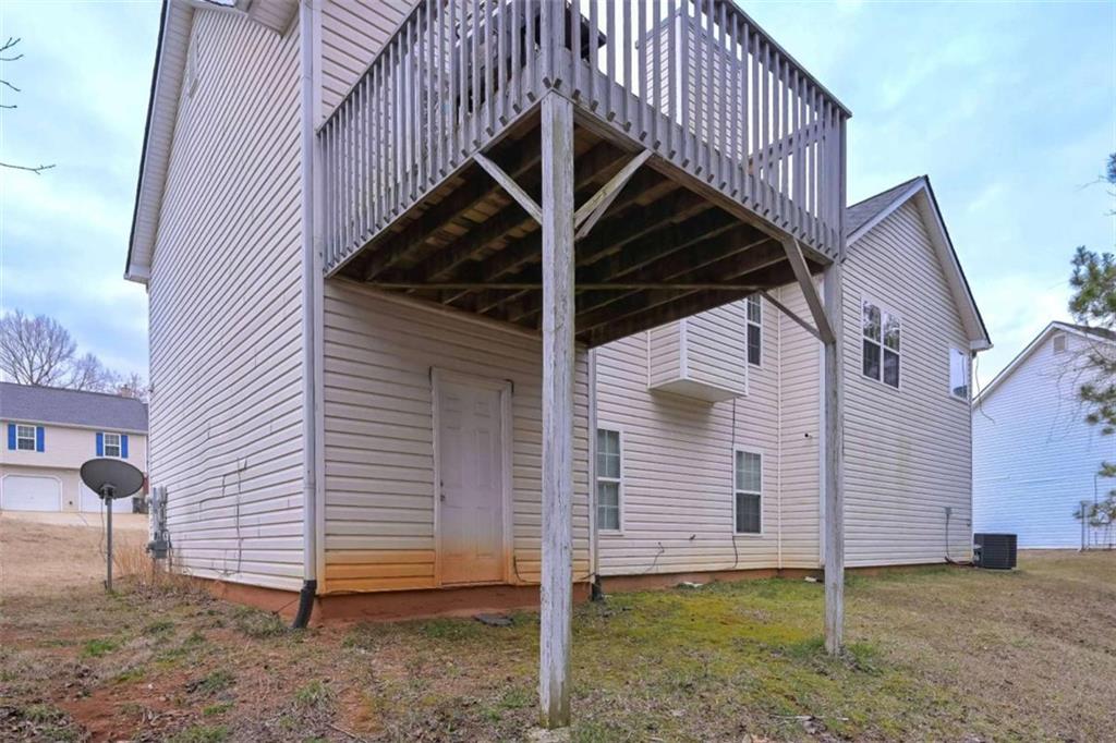 113 Millwheel Drive Villa Rica, GA 30180 - Photo 33 of 34 a view of a house with a deck