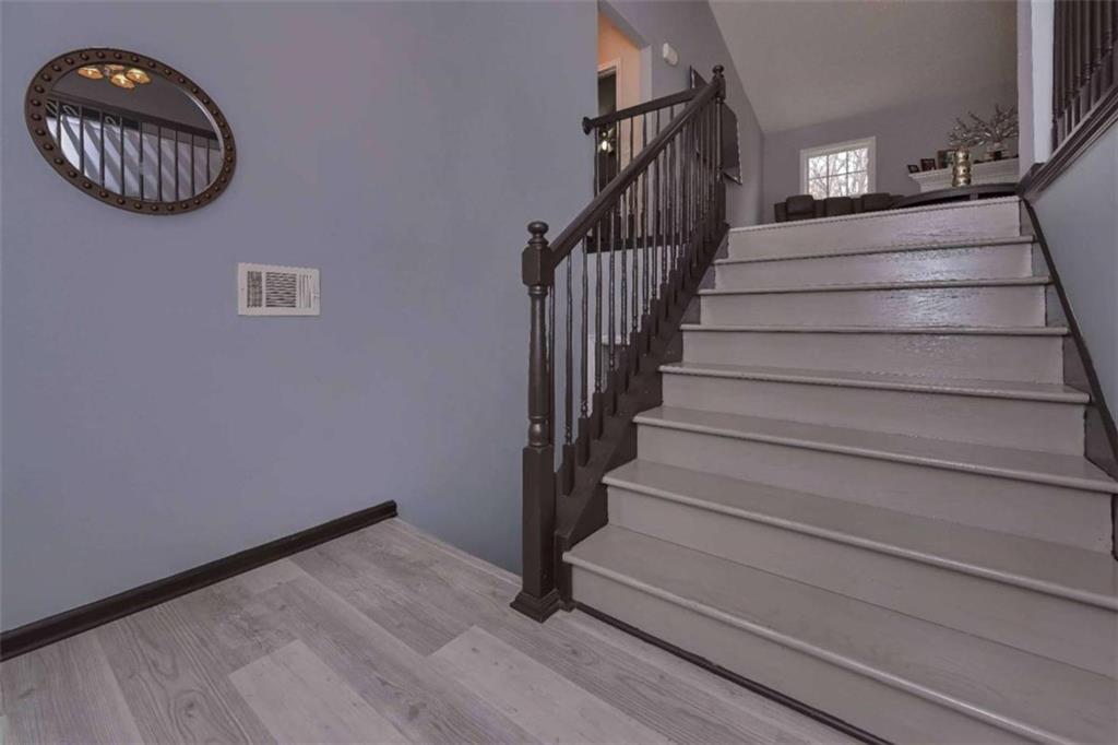 113 Millwheel Drive Villa Rica, GA 30180 - Photo 4 of 34 a view of entryway and hall with wooden floor