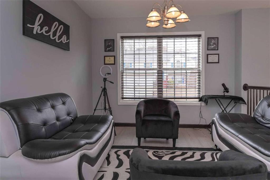 113 Millwheel Drive Villa Rica, GA 30180 - Photo 9 of 34 a living room with furniture and a large window