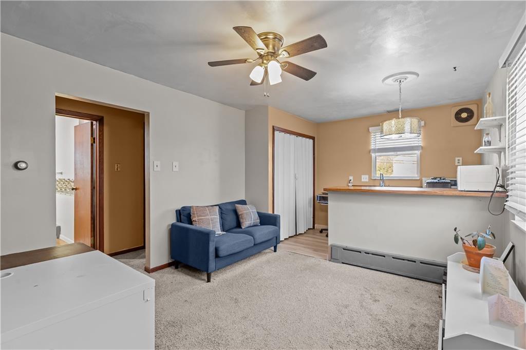 300 Highland Road Pittsburgh, PA 15235 - Photo 11 of 32 a living room with furniture and window