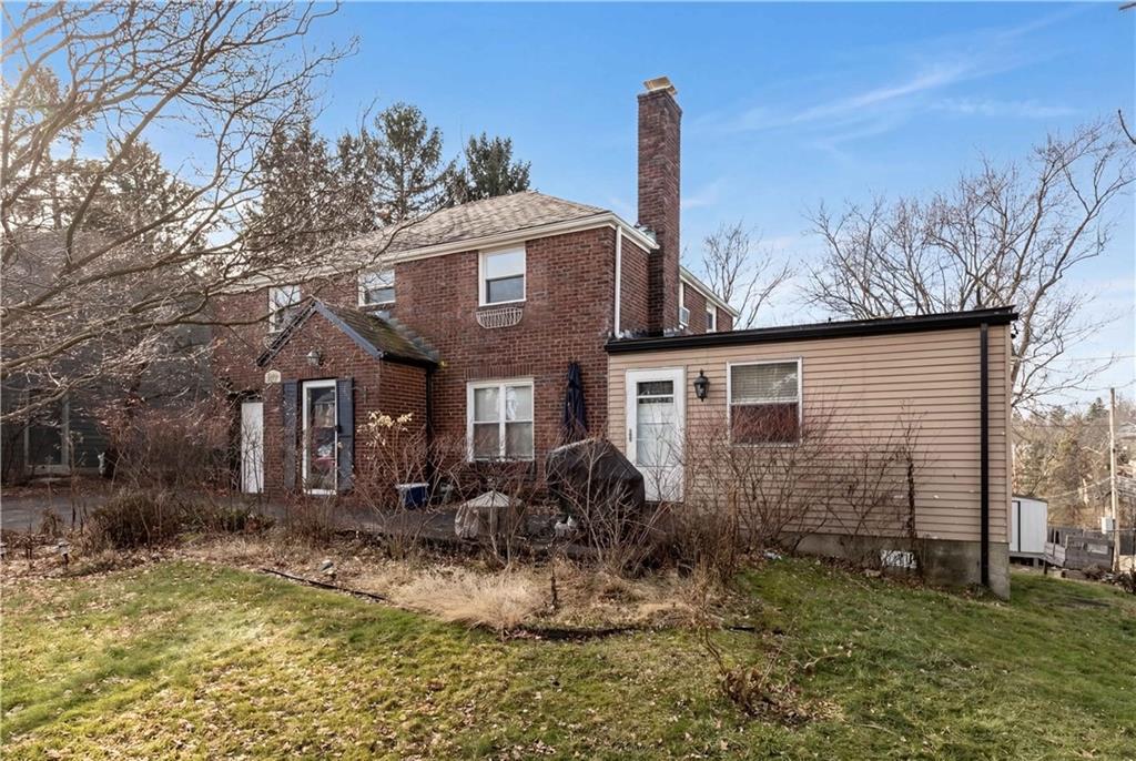 300 Highland Road Pittsburgh, PA 15235 - Photo 2 of 32 a front view of a house with garden