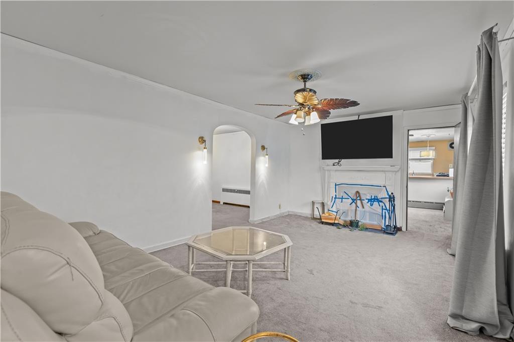 300 Highland Road Pittsburgh, PA 15235 - Photo 3 of 32 a living room with furniture and a flat screen tv