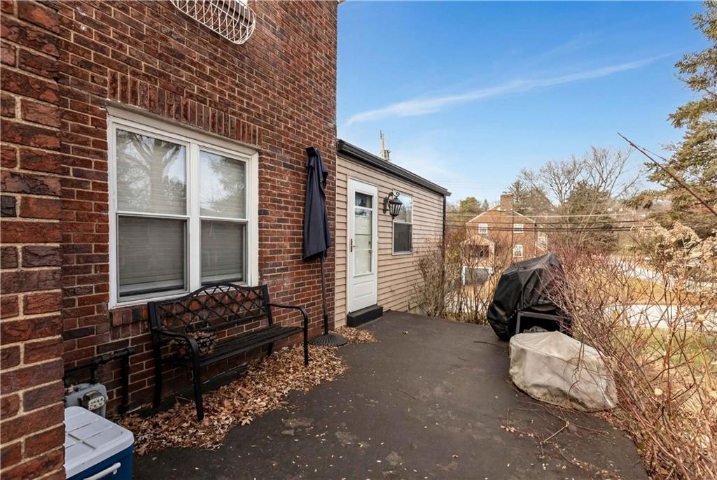 300 Highland Road Pittsburgh, PA 15235 - Photo 32 of 32 a backyard of a house with barbeque oven table and chairs