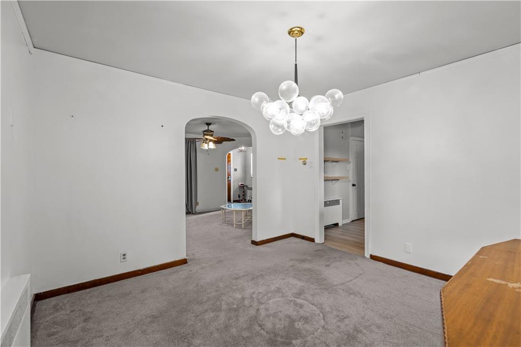 300 Highland Road Pittsburgh, PA 15235 - Photo 5 of 32 a view of a chandelier in a room