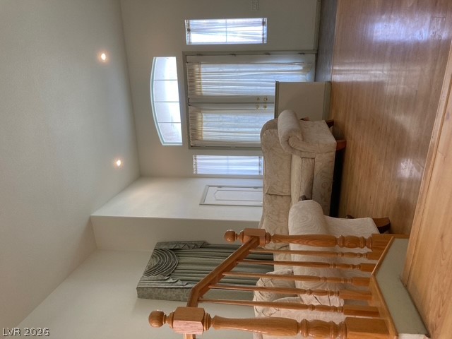 141 Rancho Maria Street Las Vegas, NV 89148 - Photo 3 of 30 High ceilings and warm wood floors define this open living area.
