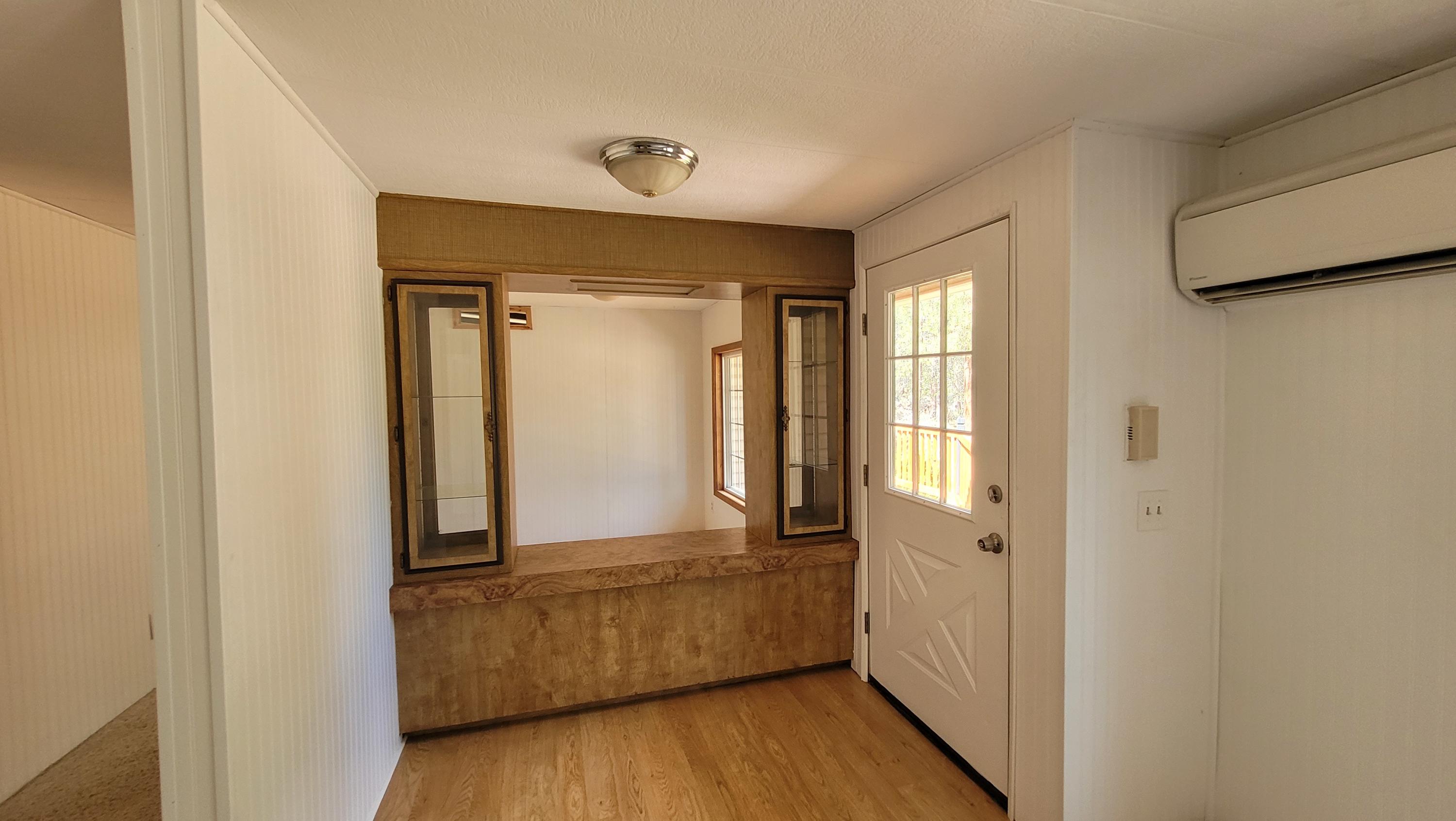 19724 Buck Canyon Road Bend, OR 97702 - Photo 11 of 38 Entry pass through to dining room/office.