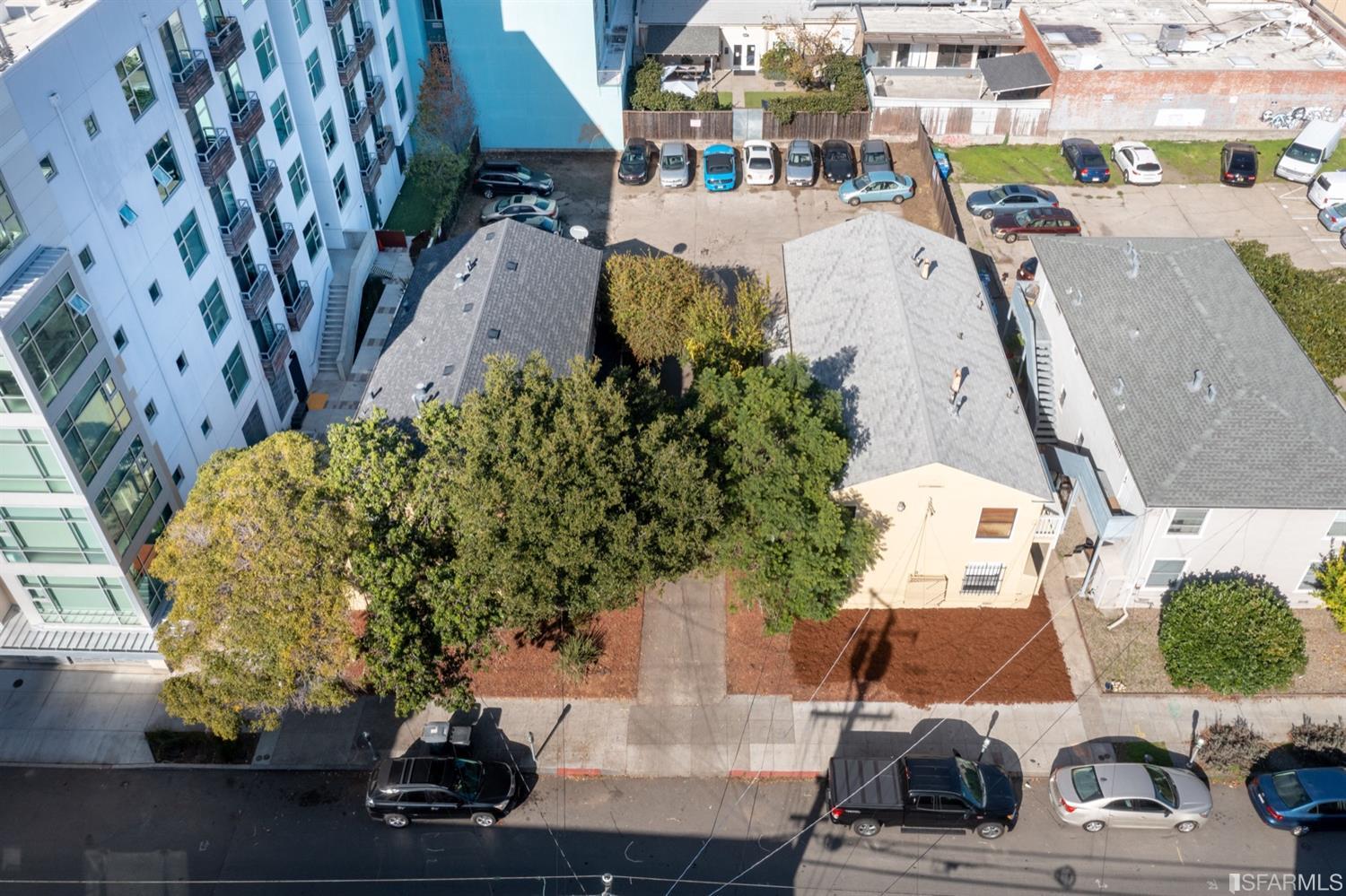 2127-2143 Dwight Way Berkeley, CA 94704 - Photo 15 of 39 an aerial view of a houses with yard
