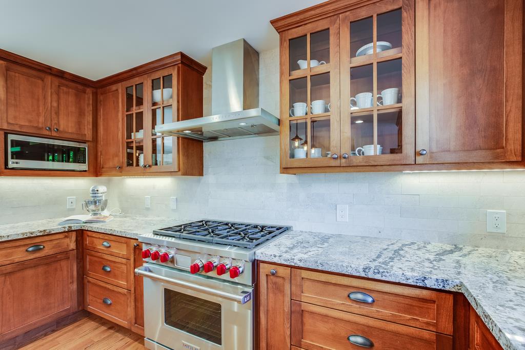 811 West Homestead Road Sunnyvale, CA 94087 - Photo 12 of 33 a kitchen with stainless steel appliances granite countertop a stove and cabinets