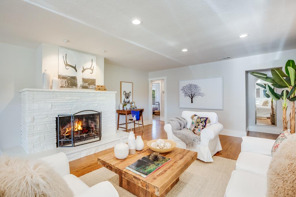 811 West Homestead Road Sunnyvale, CA 94087 - Photo 14 of 33 a living room with furniture and a fireplace