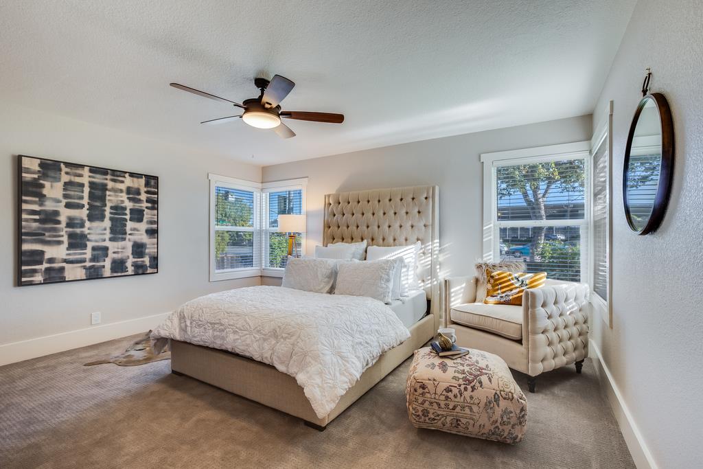 811 West Homestead Road Sunnyvale, CA 94087 - Photo 15 of 33 a bedroom with a bed a couch and a window