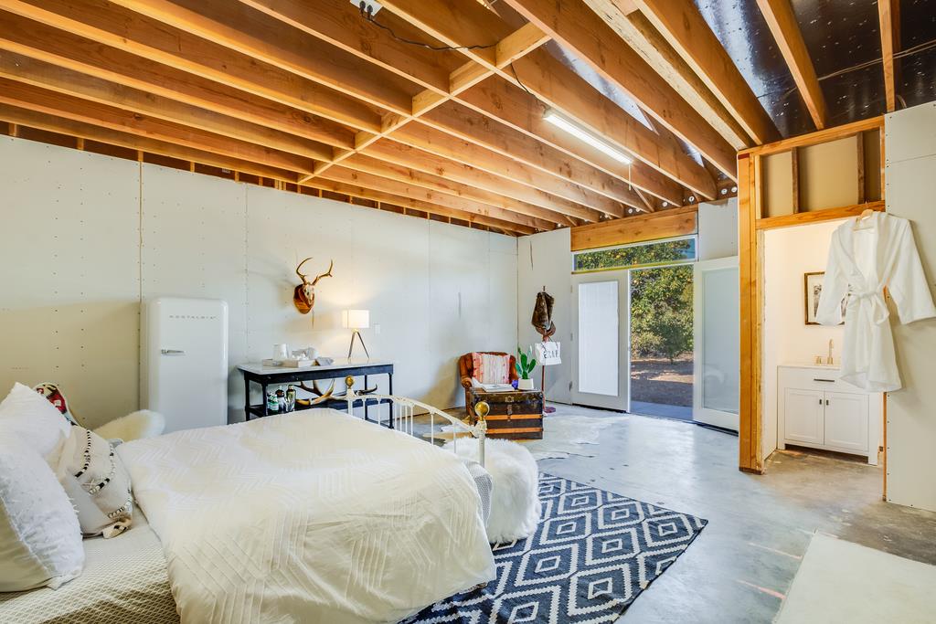 811 West Homestead Road Sunnyvale, CA 94087 - Photo 31 of 33 a bedroom with a bed and wooden floor