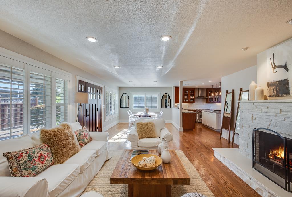 811 West Homestead Road Sunnyvale, CA 94087 - Photo 5 of 33 a living room with furniture and a fireplace