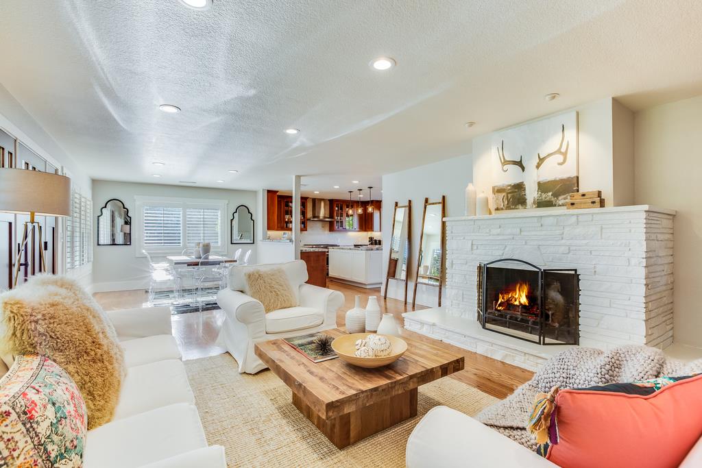 811 West Homestead Road Sunnyvale, CA 94087 - Photo 6 of 33 a living room with furniture and a fireplace