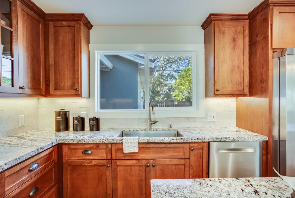 811 West Homestead Road Sunnyvale, CA 94087 - Photo 10 of 33 a kitchen with stainless steel appliances granite countertop a sink stove and refrigerator
