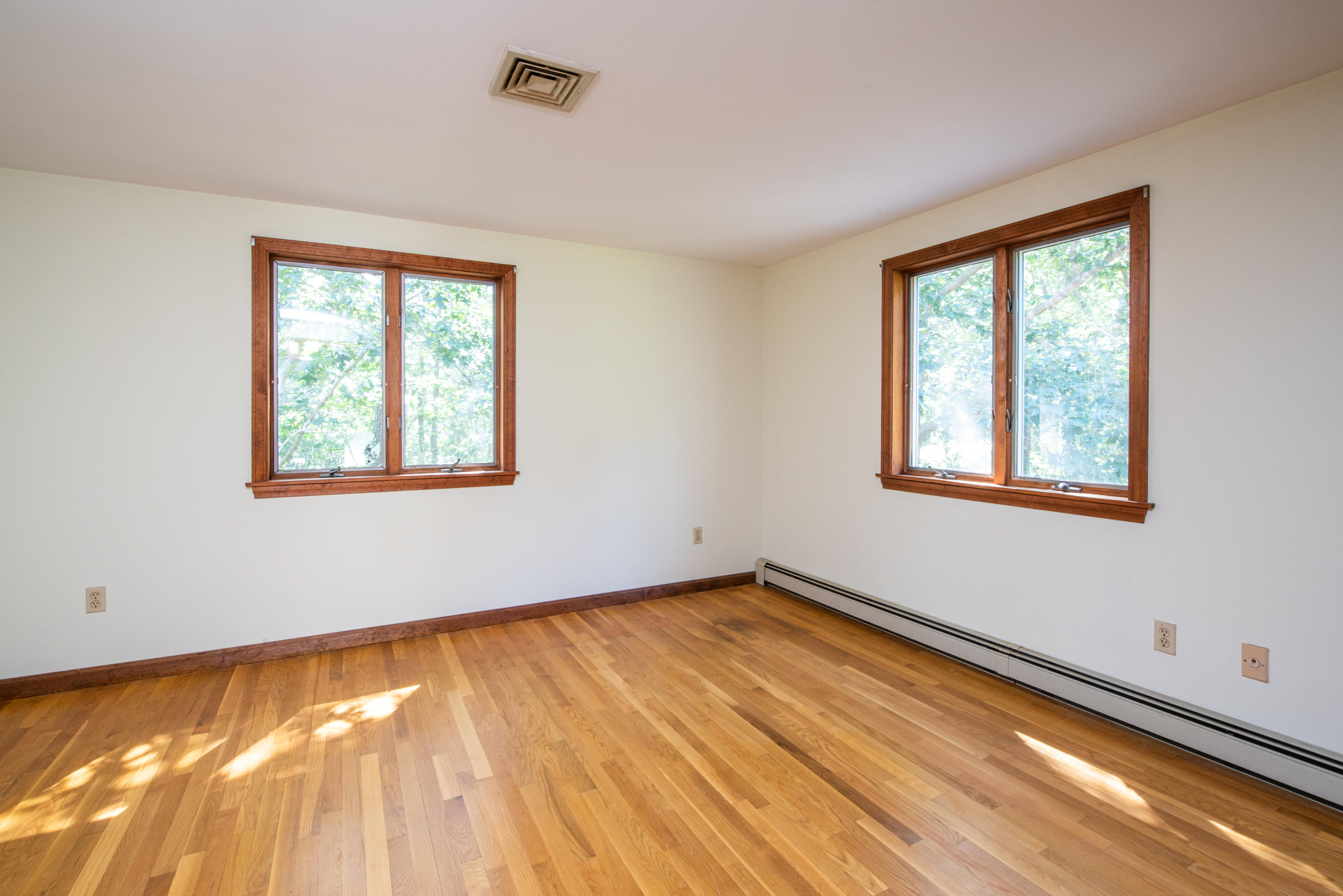 35 Oak Valley Road Wellfleet, MA 02667 - Photo 13 of 15 a view of an empty room with a window
