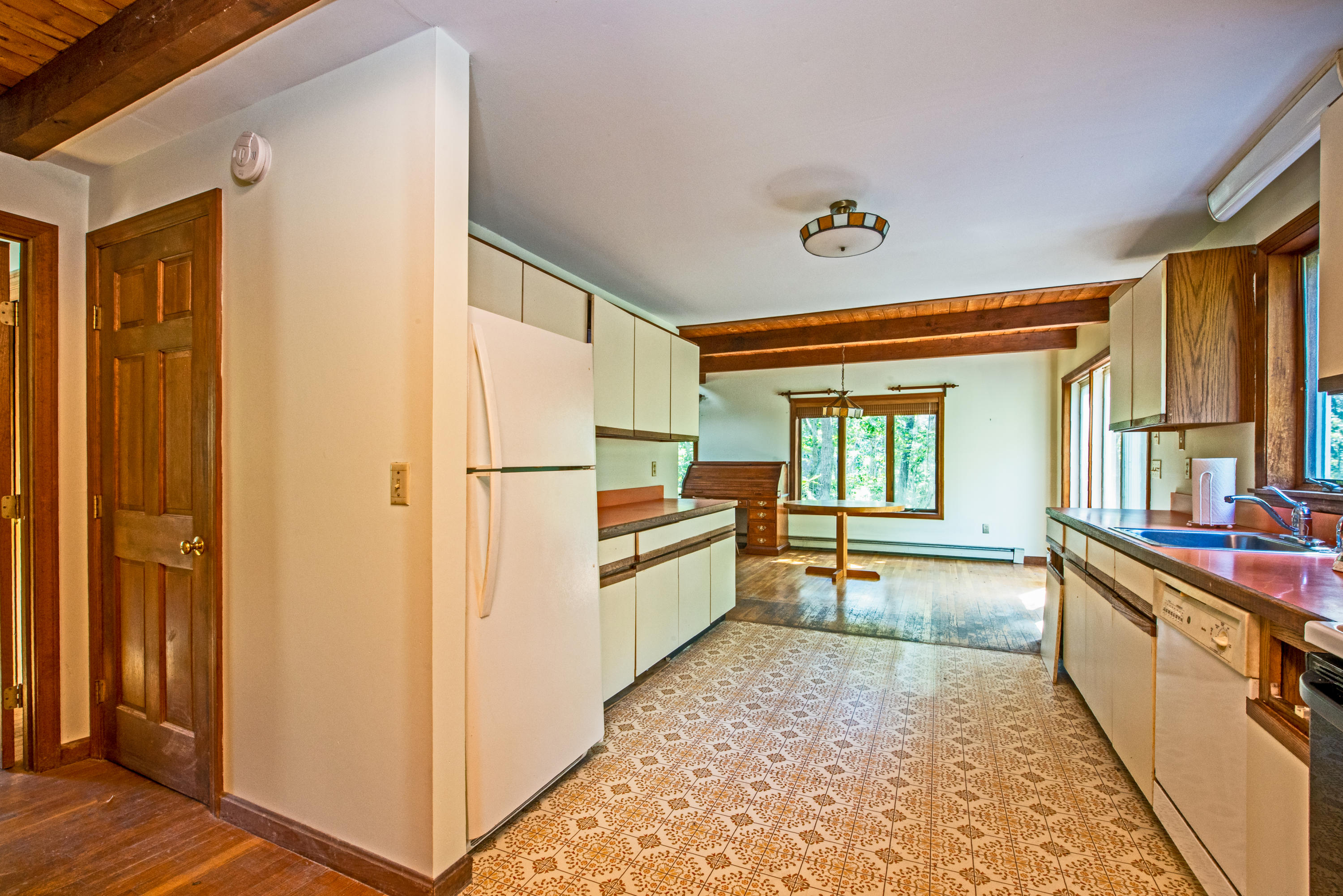 35 Oak Valley Road Wellfleet, MA 02667 - Photo 9 of 15 a kitchen with stainless steel appliances granite countertop a refrigerator and a stove top oven