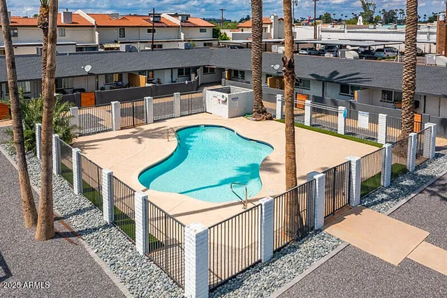 a view of a porch and garden